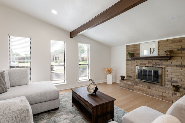 4218 Aralia St, Mesquite, TX 75150 - living room featuring wood finished floors, a brick fireplace, recessed lighting, and baseboards