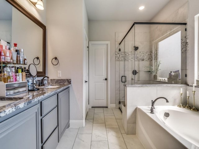 1241 Ronald St, Desoto, TX 75115 - full bath with a bath, a stall shower, double vanity, marble finish floors, and baseboards