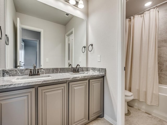 1241 Ronald St, Desoto, TX 75115 - full bathroom featuring double vanity, toilet, and shower / bath combo with shower curtain