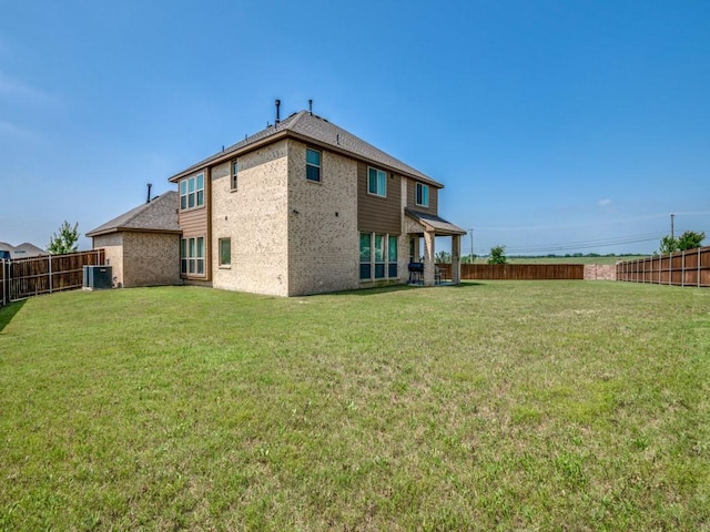 1241 Ronald St, Desoto, TX 75115 - back of property featuring central AC and brick siding