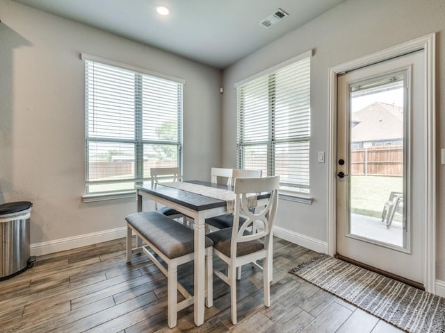 1241 Ronald St, Desoto, TX 75115 - dining room featuring plenty of natural light, baseboards, and wood finished floors