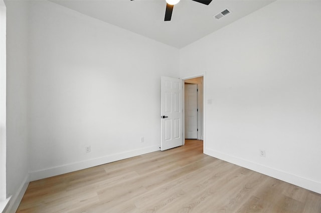 1429 Waterford Pl, Garland, TX 75044 - spare room featuring ceiling fan, wood finished floors, and baseboards