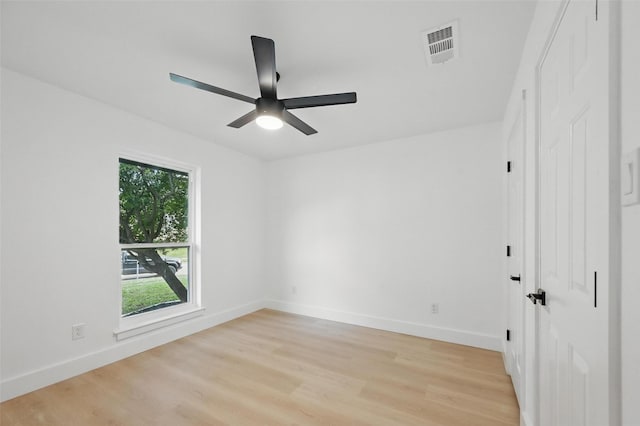 1429 Waterford Pl, Garland, TX 75044 - empty room with light wood-style floors, a ceiling fan, and baseboards