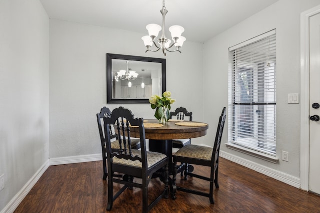 2928 Regal Rd, Plano, TX 75075 - dining room with a chandelier, baseboards, wood finished floors, and healthy amount of natural light