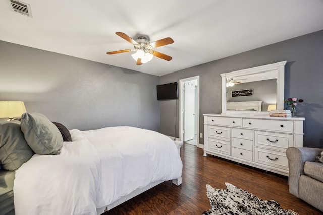 2928 Regal Rd, Plano, TX 75075 - bedroom featuring dark wood-type flooring and ceiling fan