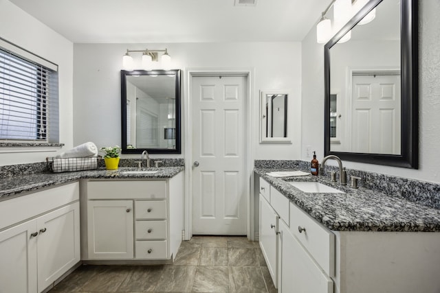 2928 Regal Rd, Plano, TX 75075 - bathroom with two vanities
