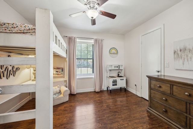2928 Regal Rd, Plano, TX 75075 - bedroom featuring dark wood-style floors, baseboards, and ceiling fan