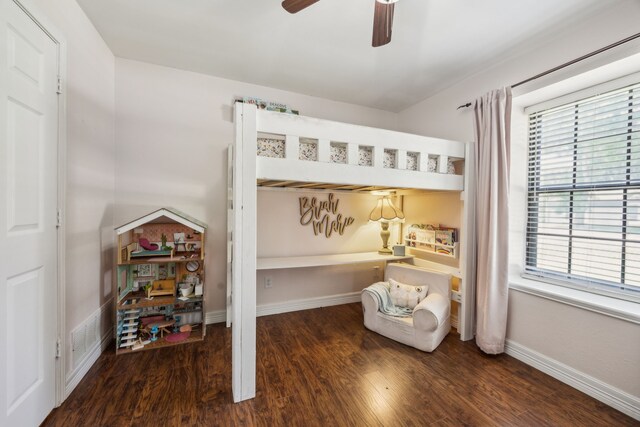 2928 Regal Rd, Plano, TX 75075 - bedroom featuring wood finished floors, multiple windows, baseboards, and ceiling fan