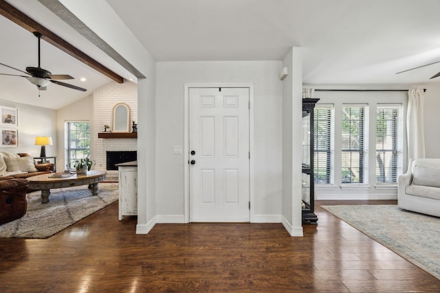 2928 Regal Rd, Plano, TX 75075 - foyer entrance with ceiling fan, dark wood finished floors, and healthy amount of natural light