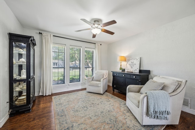 2928 Regal Rd, Plano, TX 75075 - living area with ceiling fan, baseboards, and wood finished floors