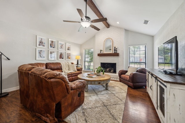 2928 Regal Rd, Plano, TX 75075 - living room featuring dark wood-style floors, a ceiling fan, plenty of natural light, and a fireplace