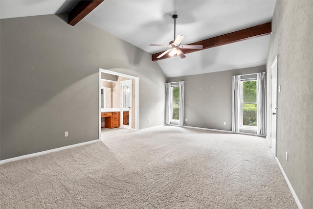 1210 Spring Lake Dr, Duncanville, TX 75137 - unfurnished bedroom featuring beam ceiling, carpet flooring, baseboards, ensuite bath, and ceiling fan