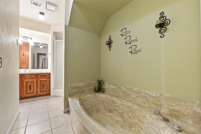 1210 Spring Lake Dr, Duncanville, TX 75137 - full bath with vanity, a shower stall, a bath, tile patterned flooring, and baseboards