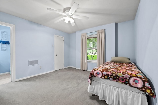 1210 Spring Lake Dr, Duncanville, TX 75137 - bedroom with carpet, baseboards, and a ceiling fan