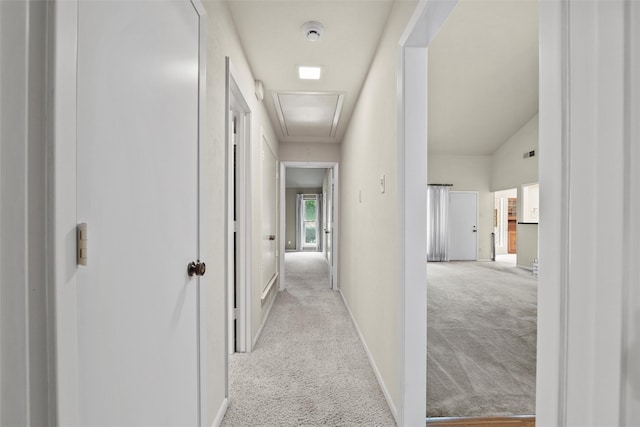1210 Spring Lake Dr, Duncanville, TX 75137 - hall with attic access, light carpet, and baseboards
