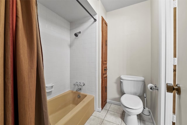 1210 Spring Lake Dr, Duncanville, TX 75137 - full bath featuring tile patterned flooring, toilet, shower / tub combination, and baseboards