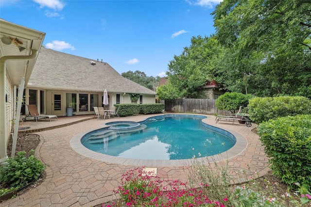 1210 Spring Lake Dr, Duncanville, TX 75137 - view of pool with a patio and a pool with connected hot tub