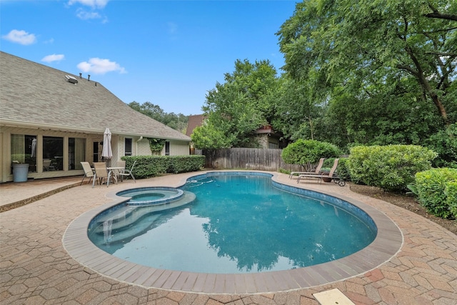 1210 Spring Lake Dr, Duncanville, TX 75137 - view of pool featuring a patio and a pool with connected hot tub