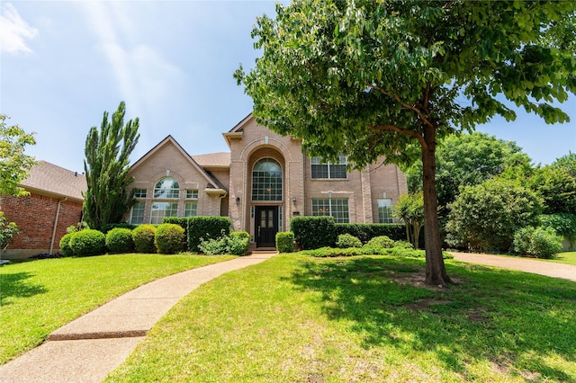 2017 Rumson Dr, Arlington, TX 76006 - view of front of home featuring brick siding and a front lawn