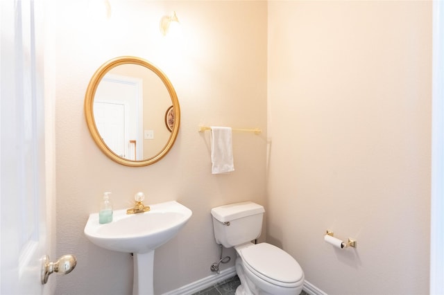 2017 Rumson Dr, Arlington, TX 76006 - bathroom featuring toilet and baseboards