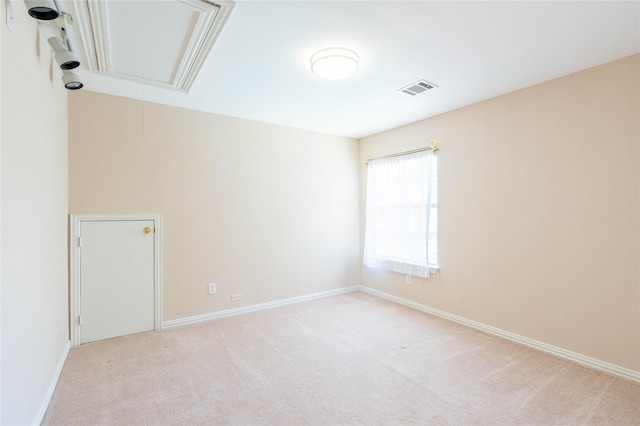 2017 Rumson Dr, Arlington, TX 76006 - spare room featuring attic access, light colored carpet, and baseboards
