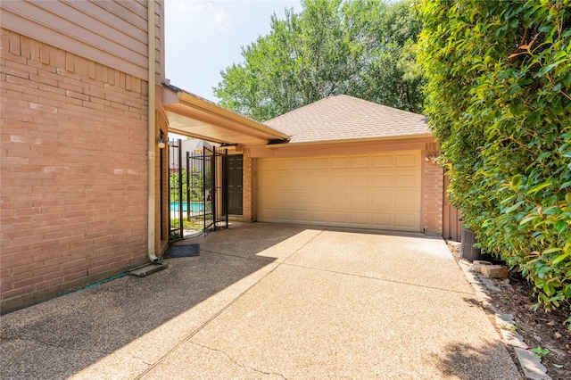 2017 Rumson Dr, Arlington, TX 76006 - garage with concrete driveway and a gate
