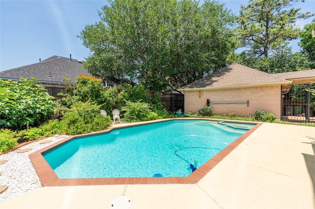 2017 Rumson Dr, Arlington, TX 76006 - view of pool featuring a fenced backyard and a patio area