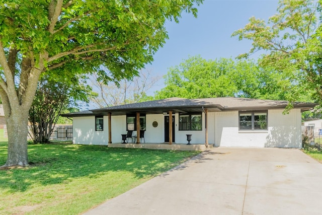 405 Valcik, Decatur, TX 76234 - view of front of property with driveway, a porch, and brick siding