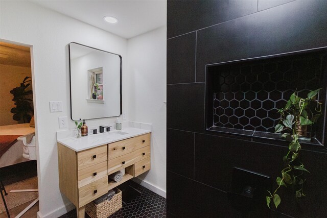405 Valcik, Decatur, TX 76234 - bathroom with vanity, baseboards, tile patterned flooring, and recessed lighting