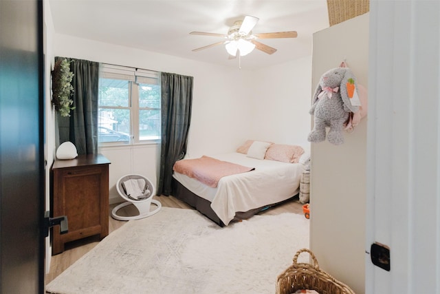 405 Valcik, Decatur, TX 76234 - bedroom with light wood-type flooring and a ceiling fan