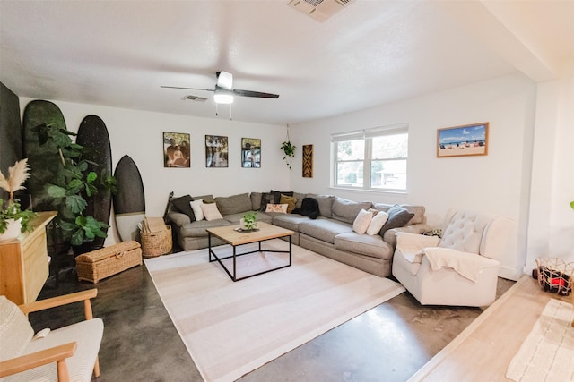 405 Valcik, Decatur, TX 76234 - living area featuring concrete flooring and a ceiling fan