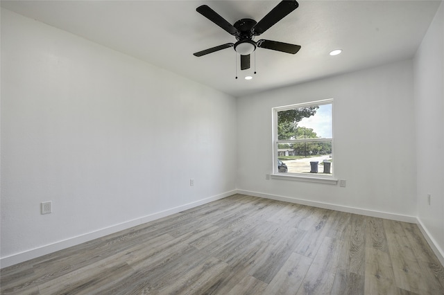 1601 Elizabeth Dr, Garland, TX 75042 - spare room featuring wood finished floors, recessed lighting, baseboards, and ceiling fan