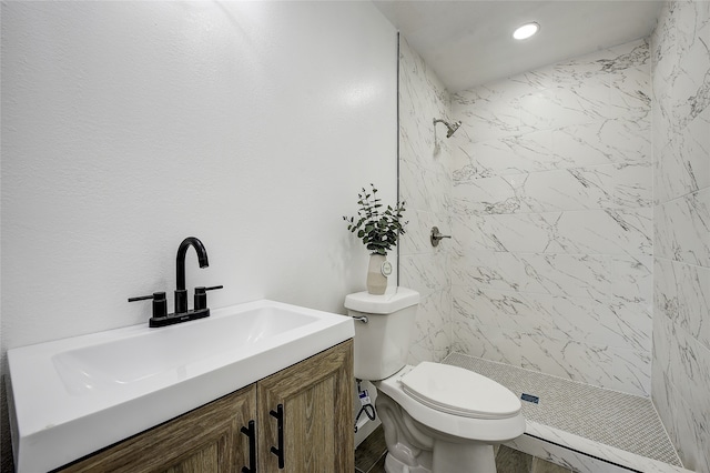 1601 Elizabeth Dr, Garland, TX 75042 - bathroom with a shower stall, toilet, vanity, and recessed lighting