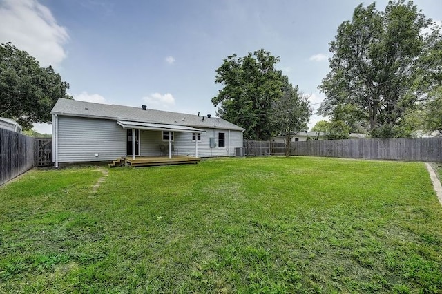 1601 Elizabeth Dr, Garland, TX 75042 - view of yard featuring a deck and central air condition unit