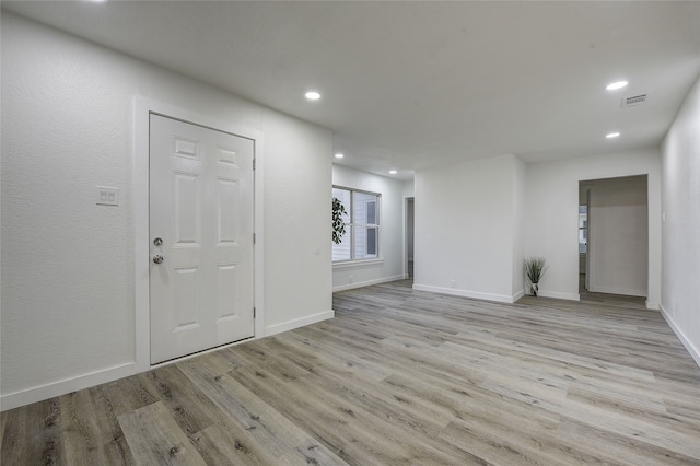 1601 Elizabeth Dr, Garland, TX 75042 - entryway featuring wood finished floors, recessed lighting, and baseboards