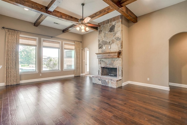 160 Solano Cir, Aledo, TX 76008 - unfurnished living room with arched walkways, baseboards, a ceiling fan, and beamed ceiling