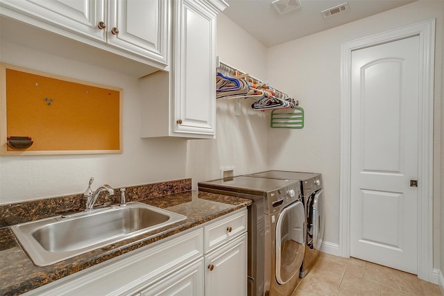 160 Solano Cir, Aledo, TX 76008 - washroom featuring cabinet space, washing machine and dryer, light tile patterned flooring, and baseboards