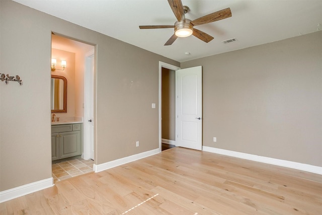 160 Solano Cir, Aledo, TX 76008 - unfurnished bedroom with light wood-type flooring, ensuite bathroom, and baseboards