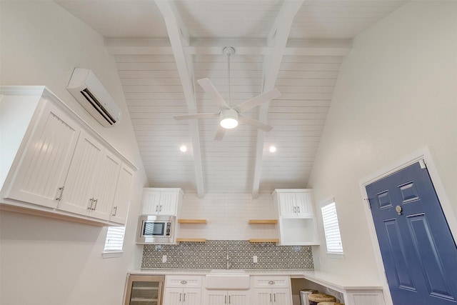 160 Solano Cir, Aledo, TX 76008 - kitchen with a sink, open shelves, stainless steel microwave, a wall mounted AC, and tasteful backsplash