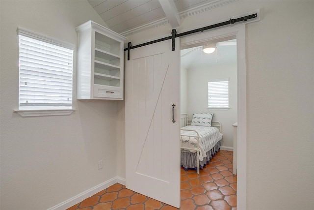 160 Solano Cir, Aledo, TX 76008 - tiled bedroom with a barn door and baseboards