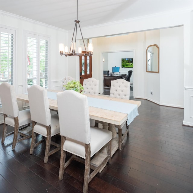 7002 Clear Springs Pkwy, Garland, TX 75044 - dining room with a chandelier, ornamental molding, and dark wood-style floors