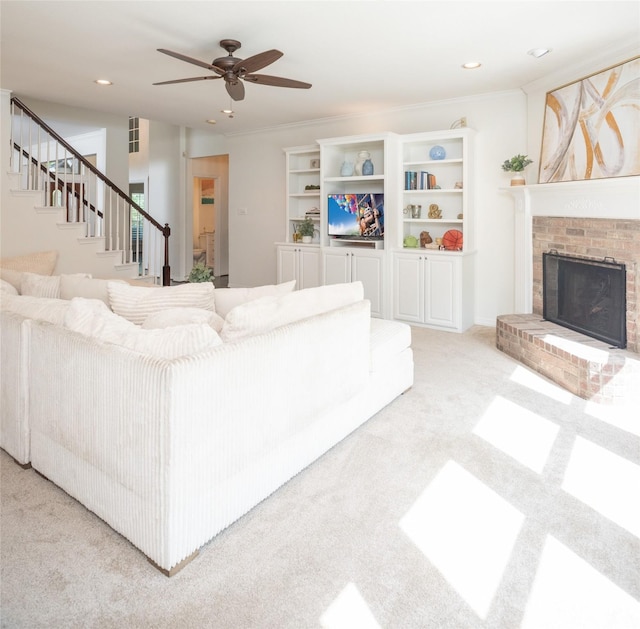 7002 Clear Springs Pkwy, Garland, TX 75044 - living room featuring light carpet, stairs, a fireplace, ceiling fan, and recessed lighting