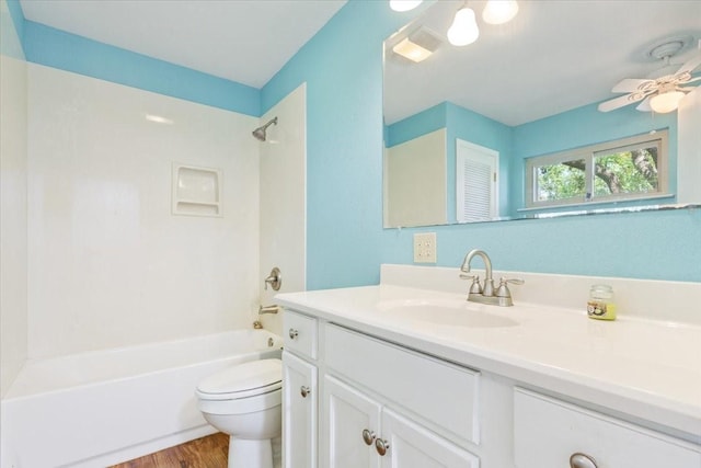 4732 Baylor Camp Rd, Crawford, TX 76638 - full bathroom featuring vanity,  shower combination, toilet, and wood finished floors