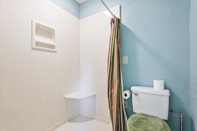 4732 Baylor Camp Rd, Crawford, TX 76638 - bathroom featuring a shower with shower curtain and toilet