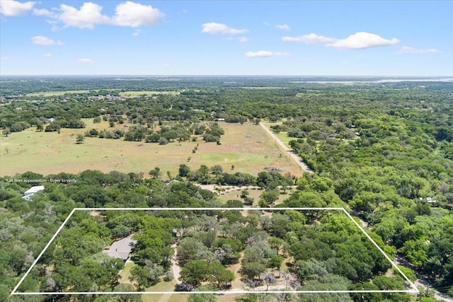 4732 Baylor Camp Rd, Crawford, TX 76638 - aerial view of property and surrounding area with property parcel outlined and a heavily wooded area