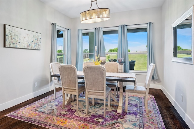 1025 Aledo Ridge Ct, Fort Worth, TX 76108 - dining area with a chandelier and dark wood-style flooring