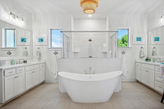 1025 Aledo Ridge Ct, Fort Worth, TX 76108 - full bath featuring a stall shower, tile patterned floors, and a soaking tub