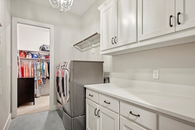 1025 Aledo Ridge Ct, Fort Worth, TX 76108 - washroom featuring washer and dryer, cabinet space, a chandelier, and light tile patterned flooring