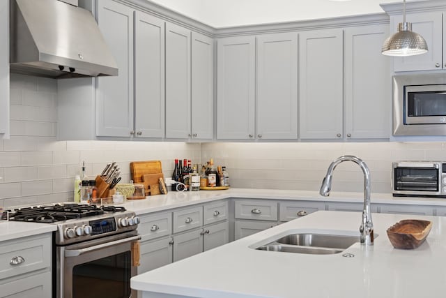 13340 Shumate Way, Malakoff, TX 75148 - kitchen featuring ventilation hood, stainless steel appliances, a sink, light countertops, and decorative backsplash