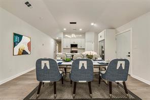 1320 E 3rd Ave, Corsicana, TX 75110 - dining space featuring wood finished floors, baseboards, and recessed lighting